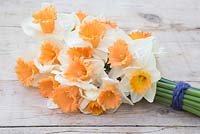 Narcissus 'Full Throttle' bouquet on a table