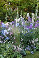 Digitalis purpurea 'Alba', Iris 'Jane Philips' amidst perennials, part of a soft pastel planting scheme. The LG Smart Garden, Designer Hay Joung Hwang, RHS Chelsea Flower Show 2016