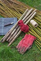 Materials required are Hazel stakes, string, gloves, knife, weed control fabric, Scarlet Willow and Common Osier Willow