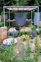 Retreat Garden. Urban Garden, steel pergola with retractable shade and louvered steel backdrop. Designer: Martin Royer Sponsors: Final5. RHS Hampton Court Palace Flower Show 2016