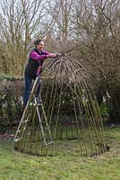 Gather the ends of the Willow sticks and tie together with twine to form the peak