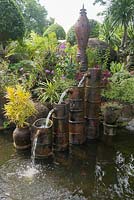 Idiosycratic fountain in a pond  in the gardens of a temple. Nha Trang Vietnam Garden 