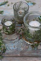 Candles decorated with Curry Plant, Rosemary, Marjoram and Mint