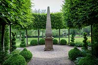 Stone obelisk in formal garden. Mitton Manor, Staffordshire. 