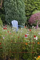 Metal rusted style border edging with red poppies - June, Bollin House, Wilmslow, Cheshire