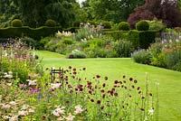 Perennial flower borders at Felley Priory in Nottinghamshire in July