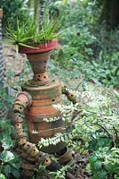 Garden feature made out of flower pots. Kebun Raja Botanical Gardens Bogor.