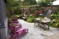 Paved courtyard with seating areas