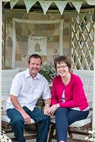 John and Elaine in their gazebo, a lovely spot for viewing their 24m x 7.6m rear town garden.