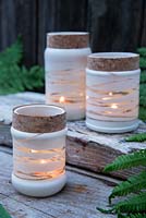 Home made garden lanterns with cork ribbons