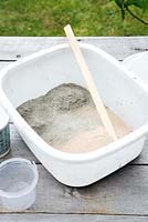 Concrete pots - 1 part concrete to 1 part sand - mix dry ingredients thoroughly