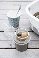 Concrete pots - Use stones to weigh inner mould down
