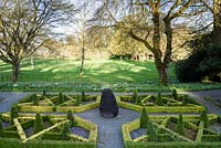 Slate garden with box parterre surrounding a slate sculpture. Hergest Croft Gardens, Kington, Herefordshire