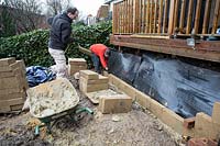 Urban garden makeover, Richmond with ACRES Gardens, bricklayer building retaining wall for existing raised decking