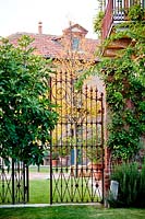 Grand metal gates. Govone. Garden project by Anna Regge. Piemonte, Italy.