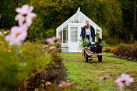 Man working in garden. Rosendals Tratgard. Stockholm. Sweden