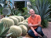 Tom Hart Dyke with Echinocactus grusonii - Golden Barrel Cactus