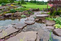 Borrowed Landscape in Naturalistic Water Garden - Jackie Knight's Just Add Water - RHS Chatsworth Flower Show 2017  Designer: Jackie Sutton - Built and sponsored by Jackie Knight Landscapes