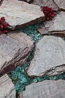 Detail of slate and glass chippings