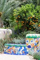 The Viking Cruises Garden of Inspiration -Citrus sinensis in a mosaic tiled container - RHS Chelsea Flower Show 2017