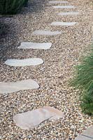 Stepping stones through gravel garden