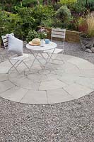 Finshed circular patio with bistro funiture 
