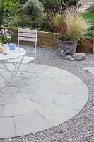 Finshed circular patio with bistro funiture 