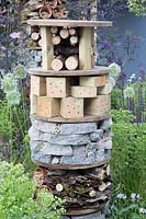 The RHS Greening Grey Britain Garden, Insect bug hotel made from reused materials - RHS Chelsea Flower Show