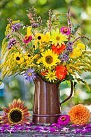Jug of summer flowers - Dahlia, Zinnia, Rudbeckia triloba, Agastache, Echinops, Aster, Verbena bonariensis, sunflower, Persicaria and Solidago.