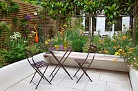 Courtyard garden with raised beds, June