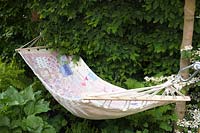 Hammock in shade of trees, A Celebration of Caravanning, RHS Chelsea 2012.