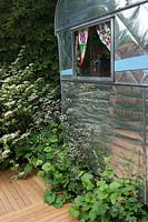 Wooden decking with aluminium caravan and Shade border, A Celebration of Caravanning, RHS Chelsea 2012.