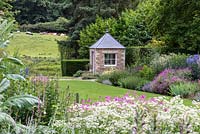 Newby Hall's double herbaceous borders past recently built Shell House, July.