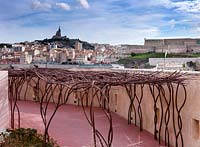 Metal pergola with view, Jardin de Migrations, Marseilles, France, February.