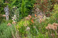 Dierama, Kniphofia, Allium globemaster, RHS Wisley, Surrey, July.