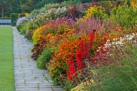 The famous double mixed border in summer stretching 128 metres down the hill - RHS garden, Wisley