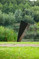 The juggernaut of naught - Sculpture in mild welded steel by Richard Trupp beside the lake 