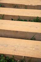 Garden path paving materials - spaced timber blocks