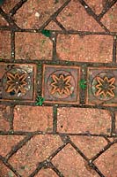 Bricks used as paving in a garden