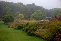 Herbaceous borders at RHS Harlow Carr on a misty October day