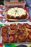 Plum and Ginger cake  - foreground -  with Carrot cake behind - prepared for National Gardens Scheme open days