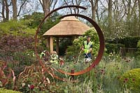 The M and G Centenary Garden 'Windows Through Time'. RHS Chelsea Flower Show. Designer Roger Platts. Build up, creating the garden