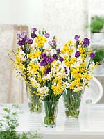 Flower bouquet with Narcissus and Eustoma in vase