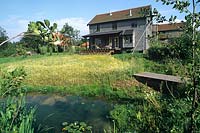 Eco friendly House with verandah Wild flower meadow garden with pond Norfolk
