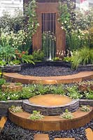 Tall rusted metal steel water feature Hosta Vista Gardening Scotland 2007 Gold Medal Binny Plants