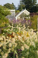 Cambo Walled Garden, Fife, Scotland, UK, border, box hedge, glasshouse, pathway, flower, autumn, perennials