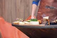 Wooden barbecue for the outdoor area