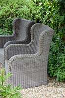 Wicker chair in the garden