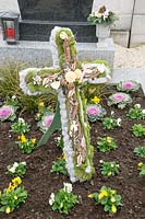 Grave decoration with moss cross