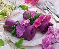 Hydranga ( hydrangea ) flowers strung to napkin rings